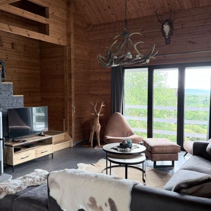 Chalet Faro Durbuy - gezellige living met haardvuur